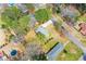 An aerial view showing the home's placement within established community with plenty of yard space at 1703 Alton Way, Marietta, GA 30062