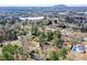 An aerial view captures this attractive property with its leafy surroundings, set in a desirable neighborhood at 1703 Alton Way, Marietta, GA 30062