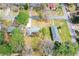 An aerial view displays the house in an established neighborhood and yard space at 1703 Alton Way, Marietta, GA 30062
