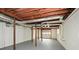 Unfinished basement with exposed ductwork and support beams offers ample storage or potential for renovation at 1703 Alton Way, Marietta, GA 30062