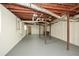 Unfinished basement showcasing utilities and supports, provides a blank canvas for customization and development at 1703 Alton Way, Marietta, GA 30062