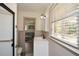 Modern bathroom with tiled shower, vanity, and ample natural light at 1703 Alton Way, Marietta, GA 30062