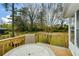Cozy deck provides a tranquil outdoor space with views of the lush backyard, perfect for enjoying nature at 1703 Alton Way, Marietta, GA 30062
