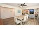 Open dining area with wood floors, neutral colors, and view into the living room at 1703 Alton Way, Marietta, GA 30062