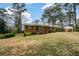 Charming brick home with a covered front porch and large front yard at 1703 Alton Way, Marietta, GA 30062