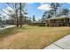 Brick home on a corner lot with mature trees at 1703 Alton Way, Marietta, GA 30062