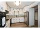 Well-lit kitchen featuring white cabinetry, modern appliances, and a functional layout at 1703 Alton Way, Marietta, GA 30062