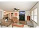 Comfortable living room featuring a decorative fireplace, ceiling fan, and neutral decor at 1703 Alton Way, Marietta, GA 30062