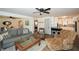 Open-concept living space with comfortable furniture and views into the dining and kitchen areas at 1703 Alton Way, Marietta, GA 30062