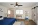 Relaxing main bedroom with sliding barn door, wood floors, and stylish décor at 1703 Alton Way, Marietta, GA 30062