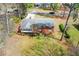 Street view displays house and landscaping, capturing neighborhood's tranquil ambiance at 1703 Alton Way, Marietta, GA 30062