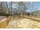 An outdoor deck provides an inviting place to enjoy the outdoors at 2037 Castlemaine Circle, Woodstock, GA 30189