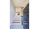 Inviting foyer features a staircase, high ceilings, and decorative lighting, creating a grand entrance at 2037 Castlemaine Circle, Woodstock, GA 30189