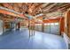Spacious garage with epoxy flooring and multiple garage door bays at 2037 Castlemaine Circle, Woodstock, GA 30189