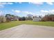 Spacious backyard with lush green grass and a detached garage at 708 Morris Rd, Hiram, GA 30141