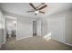 Comfortable bedroom with a ceiling fan and ensuite bathroom at 708 Morris Rd, Hiram, GA 30141