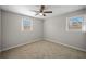 Simple bedroom with two windows and a neutral color scheme at 708 Morris Rd, Hiram, GA 30141
