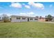 A neatly kept home with a lovely green yard, showcasing the charming and well-maintained exterior at 708 Morris Rd, Hiram, GA 30141