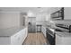 Bright kitchen featuring stainless appliances, modern cabinets, and granite countertops at 708 Morris Rd, Hiram, GA 30141