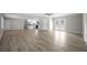 Large living room with vinyl floors and an open floor plan at 708 Morris Rd, Hiram, GA 30141