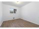 Bright bedroom with new hardwood floors and a window allowing natural light at 1894 Evans Sw Dr, Atlanta, GA 30310