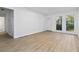 Bright, empty room with neutral walls and modern floors ready for your personal touch and decor at 1894 Evans Sw Dr, Atlanta, GA 30310