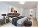 Stylishly decorated primary bedroom with an en-suite bathroom, offering comfort and convenience at 1894 Evans Sw Dr, Atlanta, GA 30310