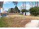 A sizable backyard with an old shed and a cozy patio area. Ready for your personal touch at 6274 Katelyn Park, Lithonia, GA 30058