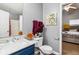 Bathroom with toilet, shower with glass door, and vanity with marble countertop at 6274 Katelyn Park, Lithonia, GA 30058