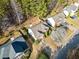 Beautiful aerial view of the home shows landscape and mature trees at 217 Park Creek Dr, Woodstock, GA 30188