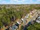Aerial view of community shows the mature tree coverage and neighborhood at 217 Park Creek Dr, Woodstock, GA 30188
