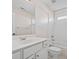 Clean and bright bathroom featuring a vanity, toilet, and shower/tub combination, offering essential amenities at 217 Park Creek Dr, Woodstock, GA 30188