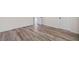Wood-look floors add warmth and style to the bedroom; ready for personalization at 217 Park Creek Dr, Woodstock, GA 30188