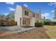 Exterior view of home and back patio area with fenced in backyard at 217 Park Creek Dr, Woodstock, GA 30188