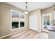 Breakfast nook with large windows and tile floors for a bright, cozy dining space at 217 Park Creek Dr, Woodstock, GA 30188
