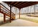 A backyard featuring a wooden deck with stairs descending to the yard at 4020 F A A Rd, Cumming, GA 30041