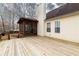 Exterior of home featuring deck and screened porch for outdoor living and entertaining at 4020 F A A Rd, Cumming, GA 30041