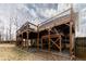 Multi-tiered wooden deck perfect for outdoor entertaining and relaxation at 4020 F A A Rd, Cumming, GA 30041