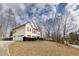 Charming two-story home featuring a two-car garage and well-maintained yard at 4020 F A A Rd, Cumming, GA 30041