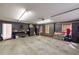 Garage with storage and workspace, featuring gray walls and concrete floor at 4020 F A A Rd, Cumming, GA 30041