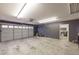 Well-lit garage with a neutral color scheme and plenty of open space at 4020 F A A Rd, Cumming, GA 30041