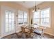 Charming breakfast nook bathed in natural light, perfect for morning coffee and casual meals at 4020 F A A Rd, Cumming, GA 30041