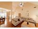Living area boasts hardwood flooring and a vaulted ceiling and offers seamless access to the dining room at 4020 F A A Rd, Cumming, GA 30041