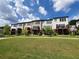 Townhouse community featuring a manicured green space and walking paths at 4191 Wisconsin Dr, Dunwoody, GA 30338