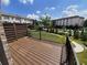 View from the deck of townhouses featuring a manicured green space and walking paths at 4191 Wisconsin Dr, Dunwoody, GA 30338