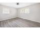 Inviting bedroom featuring neutral walls, hardwood floors, and windows that provide plenty of natural light at 4611 Old Westside Rd, Austell, GA 30106