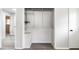Walk-in closet with hanging racks and shelving for optimal storage at 4611 Old Westside Rd, Austell, GA 30106