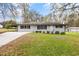 Charming one-story home with a well-manicured lawn and a convenient carport at 4611 Old Westside Rd, Austell, GA 30106