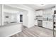 Open kitchen design with granite counters, white cabinets, and new stainless steel appliances at 4611 Old Westside Rd, Austell, GA 30106