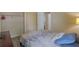 Bright bedroom featuring a comfortable bed, providing a peaceful retreat for rest and relaxation at 4938 Terrace Green Trce, Stone Mountain, GA 30088